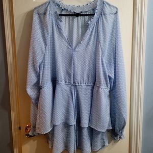 Beautiful sheer Pelplum blouse.